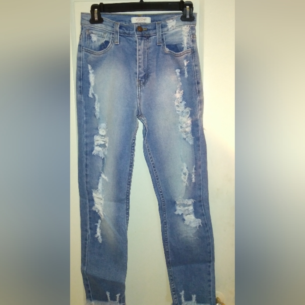 Vibrant M.I.U medium wash crop distressed skinny Jean with stretch fabric.